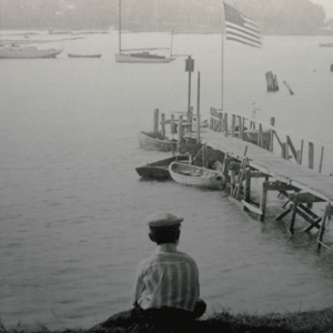 Northport Harbor Mural showing a boy looking down at the harbor circa 1910